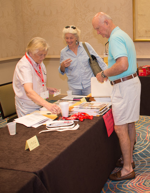 Pat registering Tony Clinger and guest Linda McElhiney ‘59, Thursday, Thursday Night